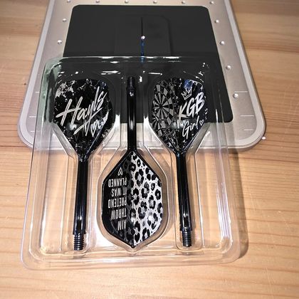 A mixed set reading Hayls and KGB Girl, with a leopard print flight