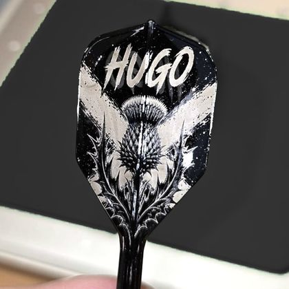 A flight engraved Hugo above a Scottish thistle