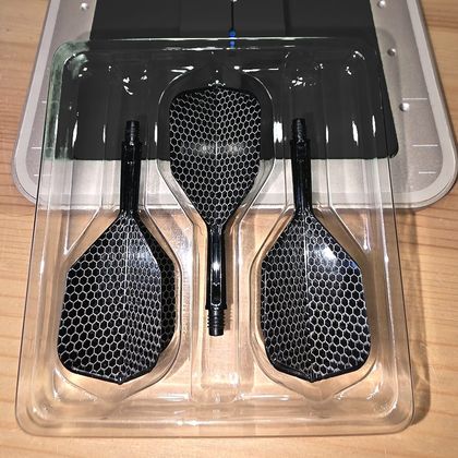 Three black flights in a white honeycomb pattern