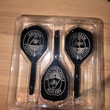 An Aberdeen Football Club crest set in its tray