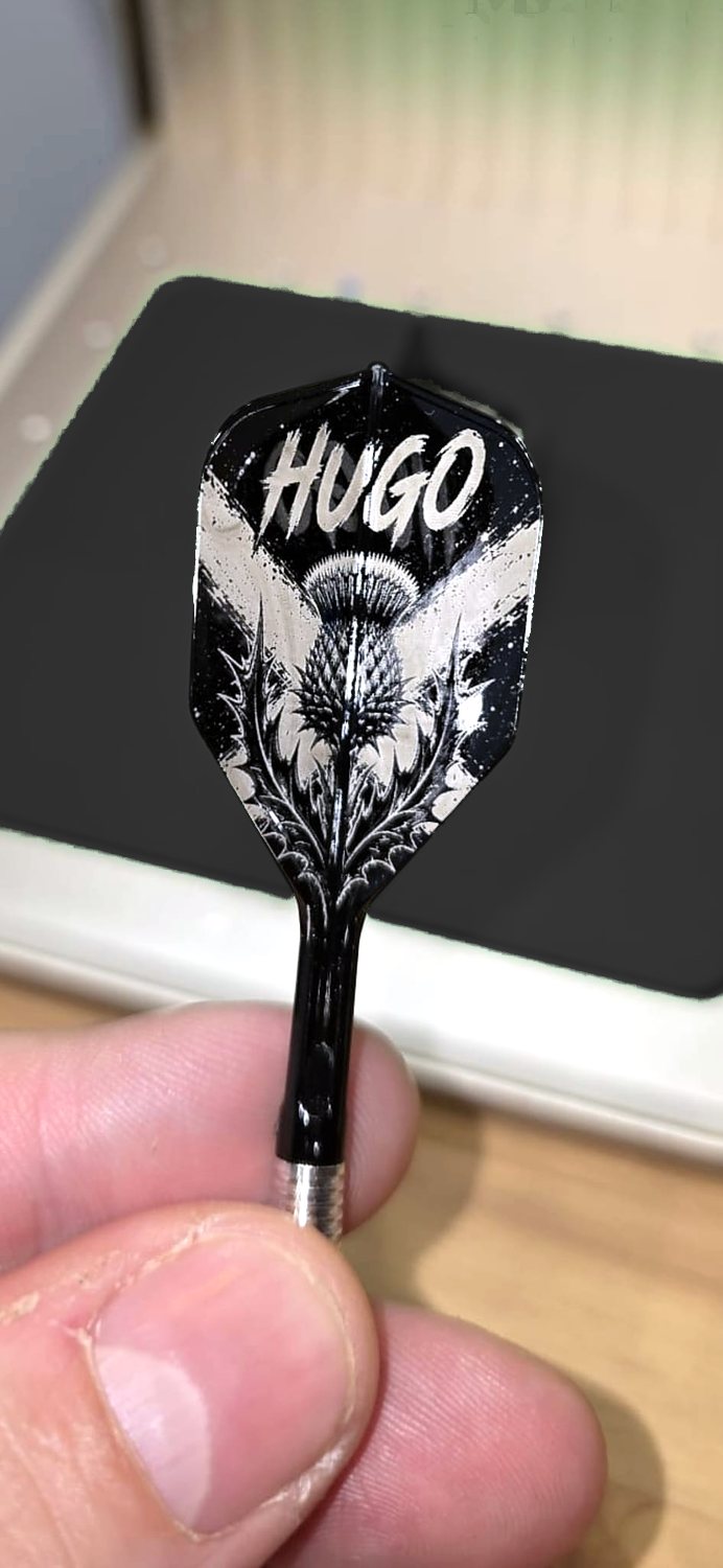A flight engraved Hugo above a Scottish thistle